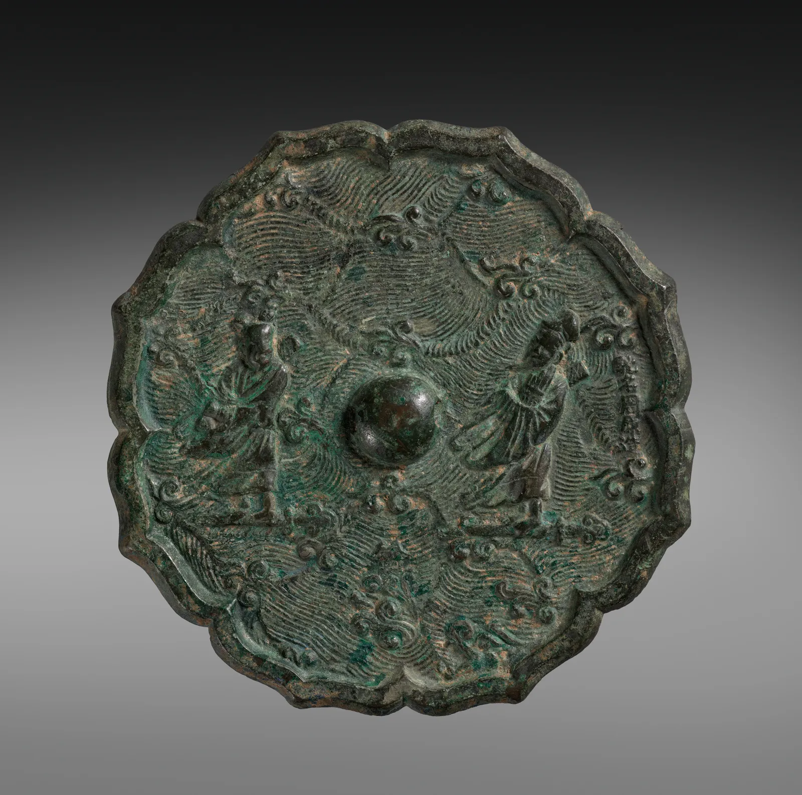 Octafoil bronze mirror with two immortals crossing waves.