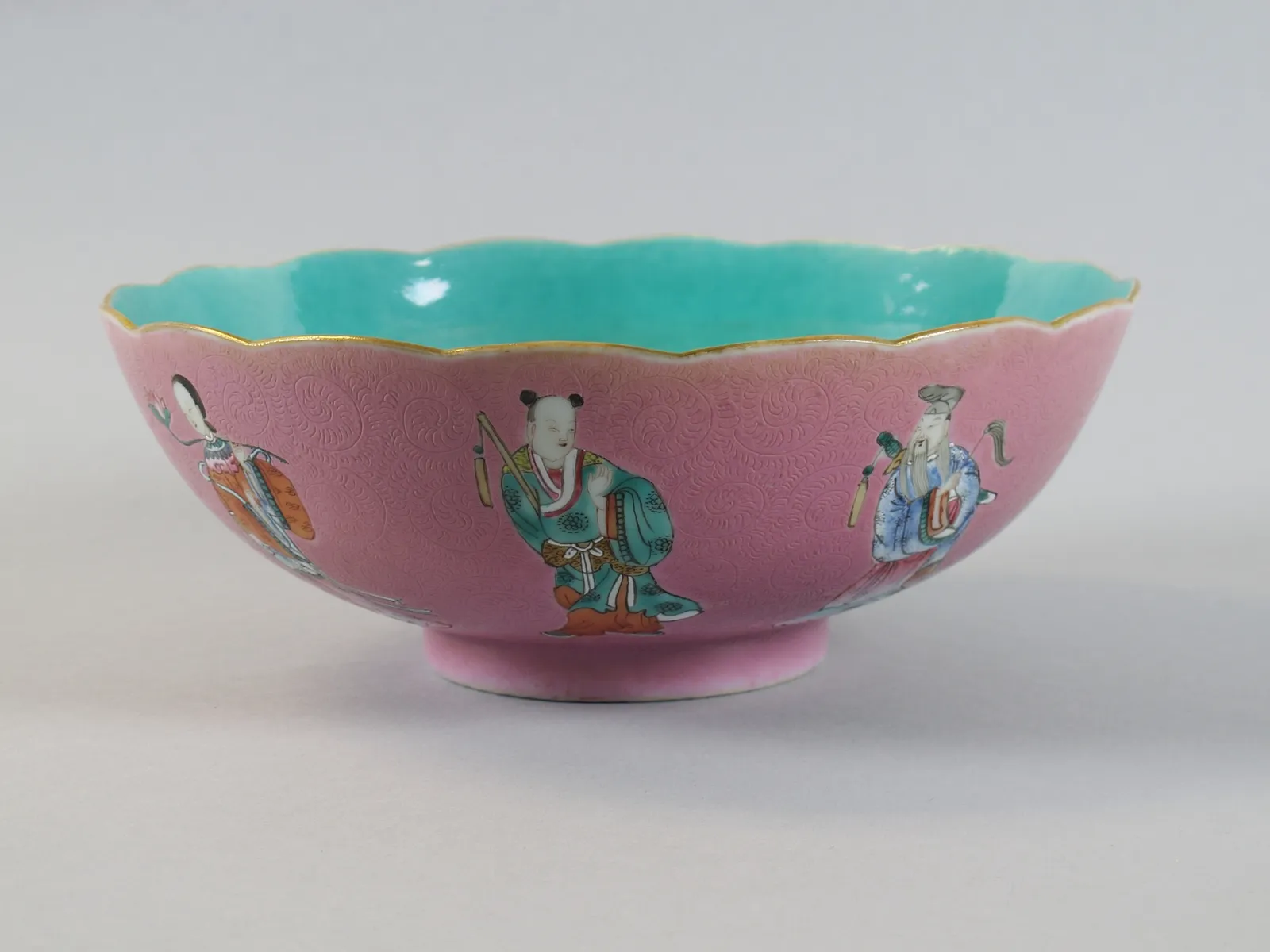 Porcelain bowl with the Eight Immortals over a pink ground, rotation view 2.