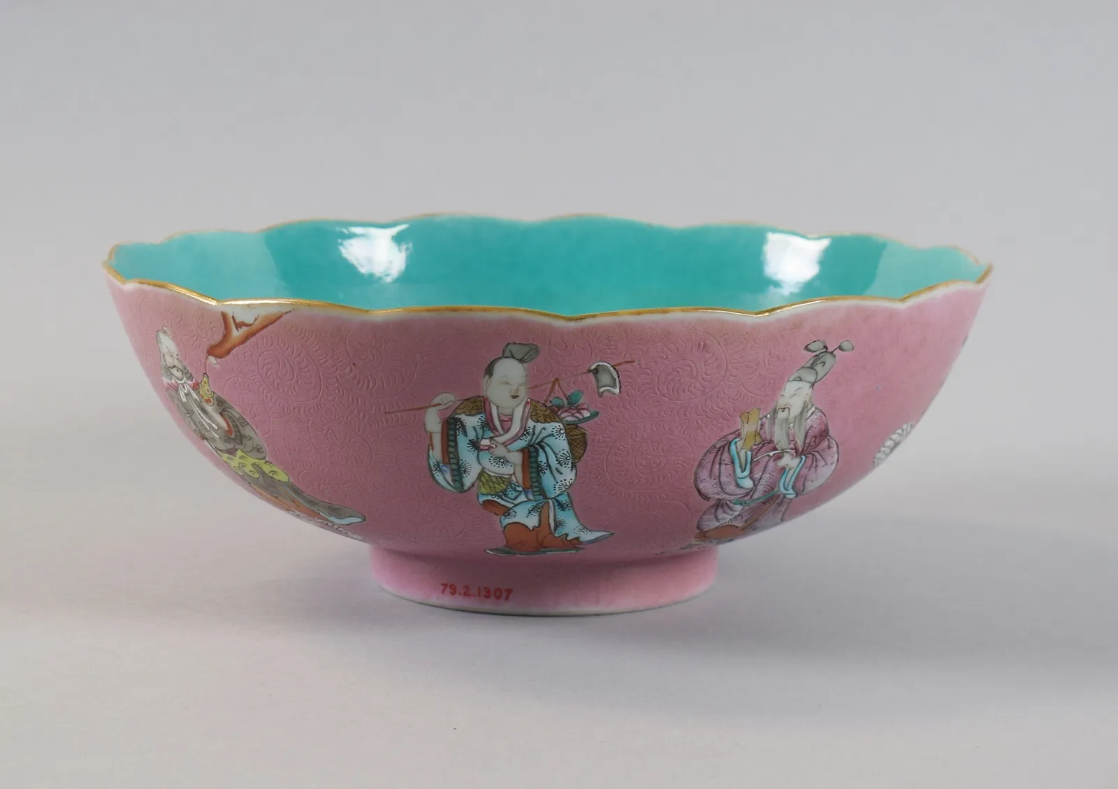 Porcelain bowl with the Eight Immortals over a pink ground, rotation view 5.