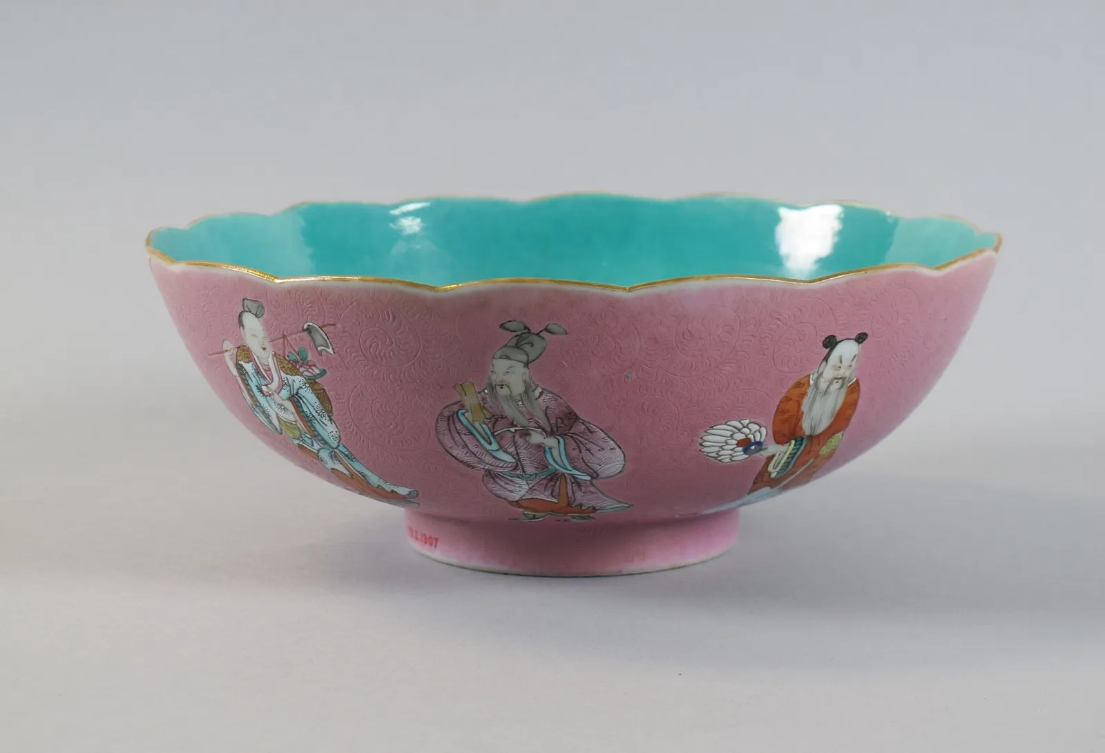 Porcelain bowl with the Eight Immortals over a pink ground, rotation view 6.