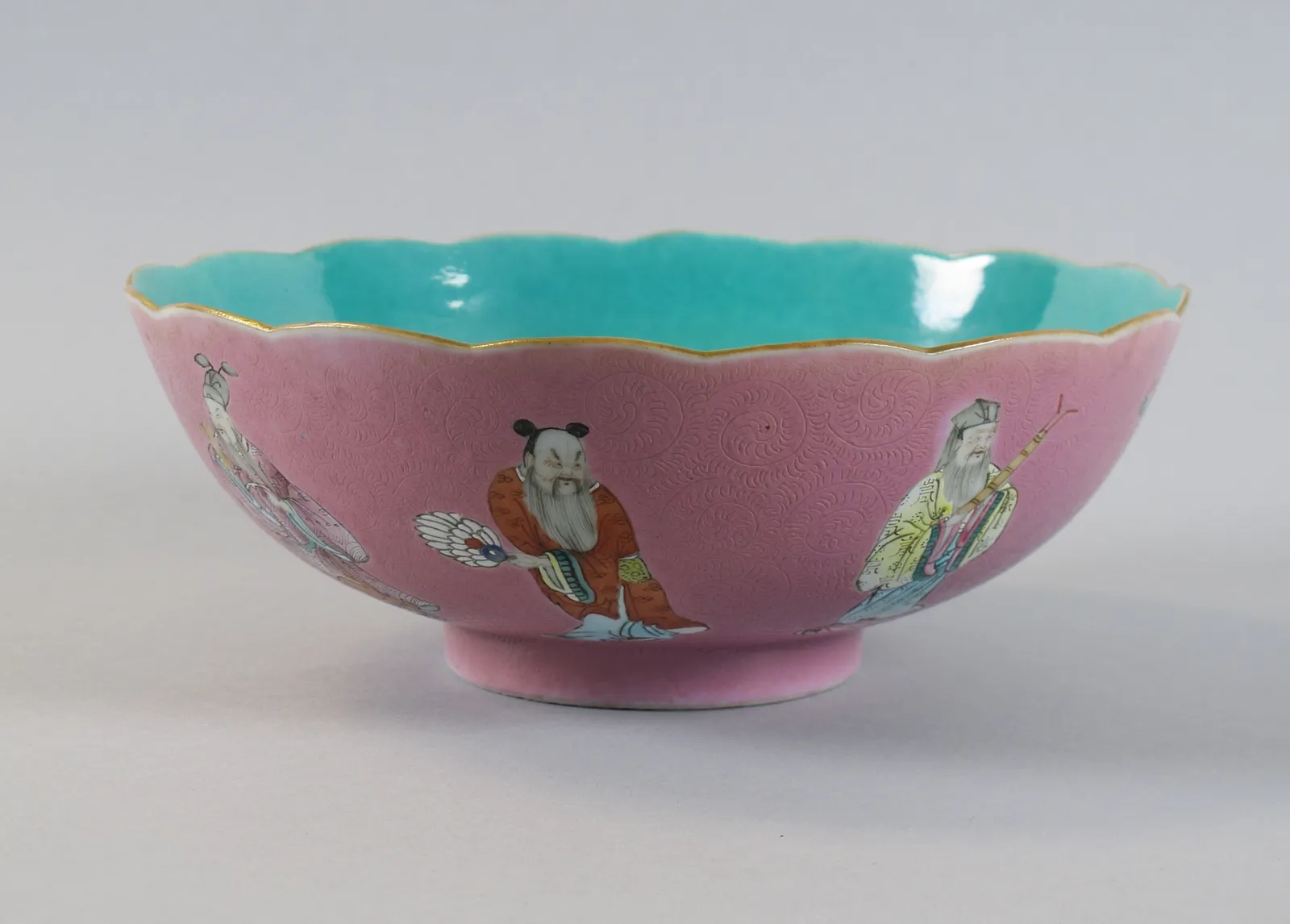 Porcelain bowl with the Eight Immortals over a pink ground, rotation view 7.