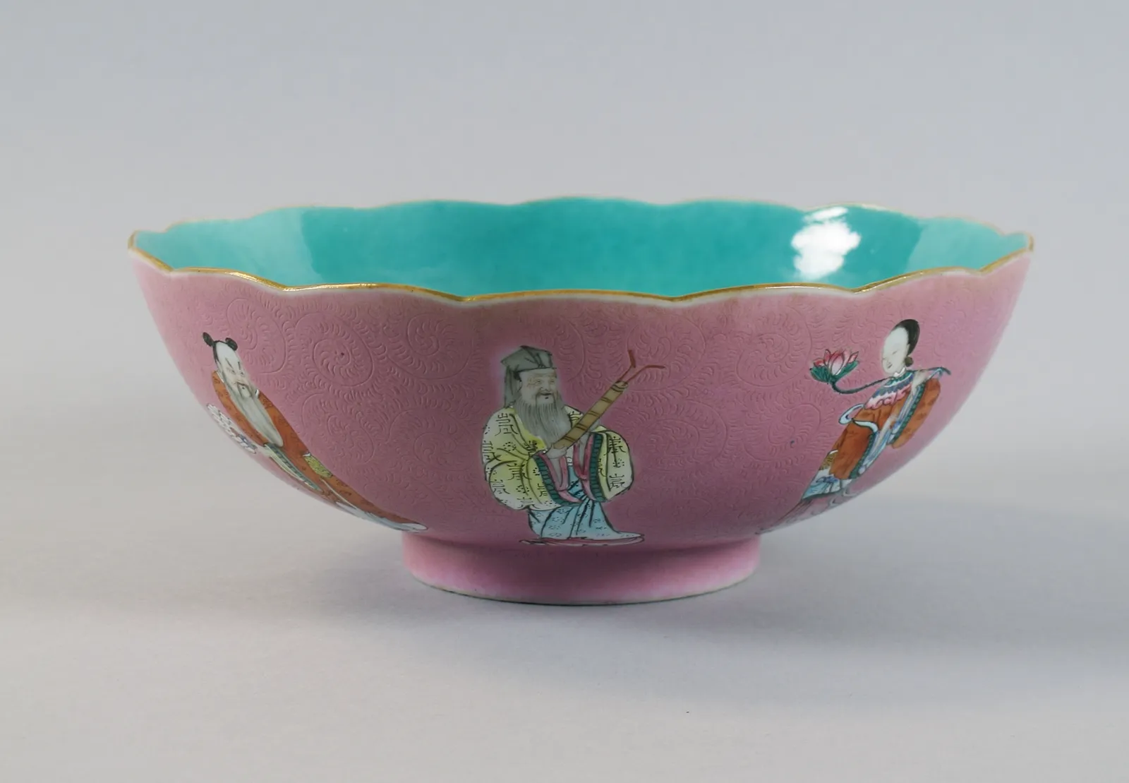 Porcelain bowl with the Eight Immortals over a pink ground, rotation view 8.