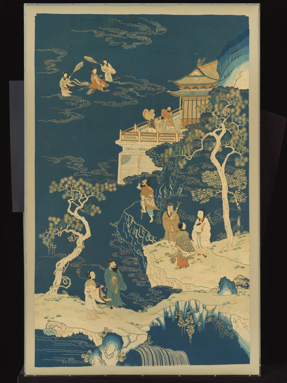 Chinese embroidered textile panel with immortals in a vertical composition.